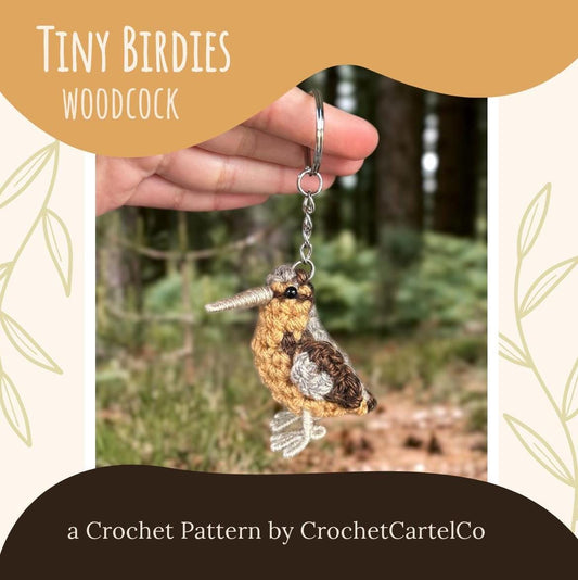 Crocheted woodcock keychain pattern shown held by a hand with a natural background