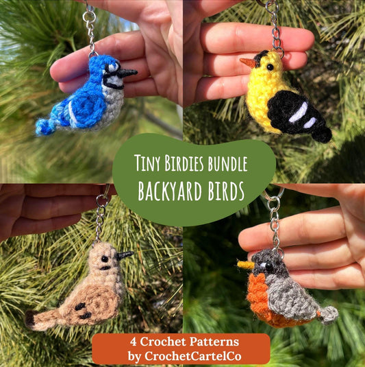 Four crochet bird keychain crochet patterns shown held by a hand with a green leafy background, featuring 'Tiny Birdies Bundle Backyard Birds' by CrochetCartelCo.