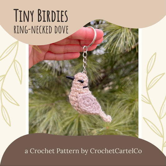 Crocheted ring-necked dove keychain crochet pattern shown held by a hand with a natural background