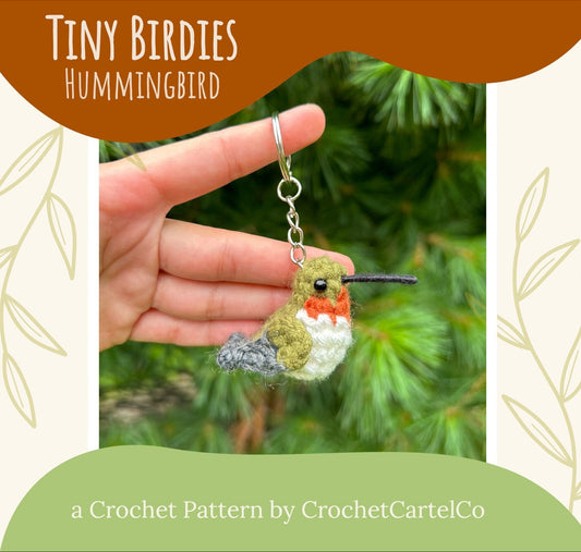 A crochet hummingbird keychain crochet pattern shown with a green leafy background