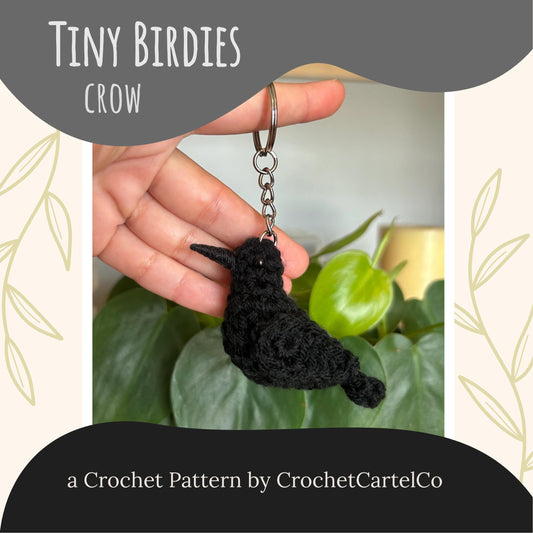 Black bird keychain crochet pattern shown with green leaves in the background