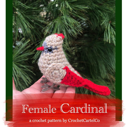 Crochet pattern for a female cardinal held against a green leafy background with 'Female Cardinal' text and 'CrochetCartelCo' branding.
