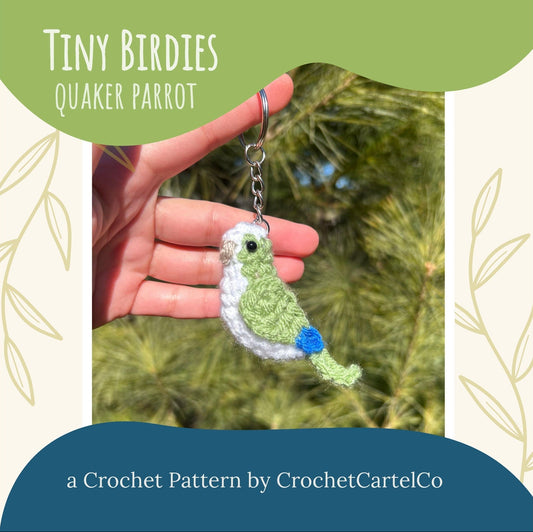 Crocheted parrot keychain crochet pattern shown held in a hand with a natural background