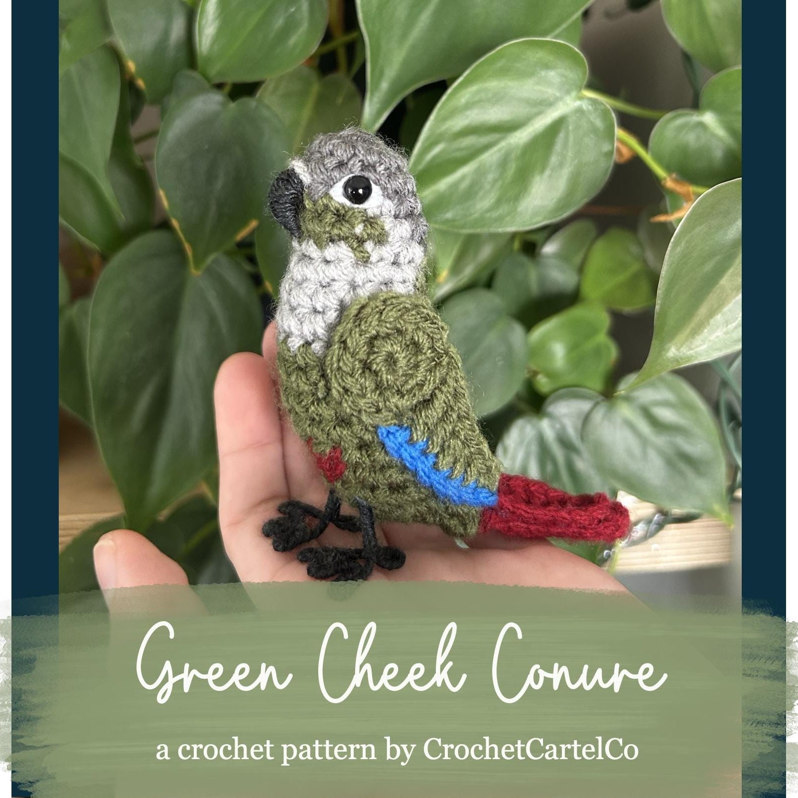 Crocheted Green Cheek Conure pattern, shown held in a hand with a plant in the background, featuring the brand CrochetCartelCo.