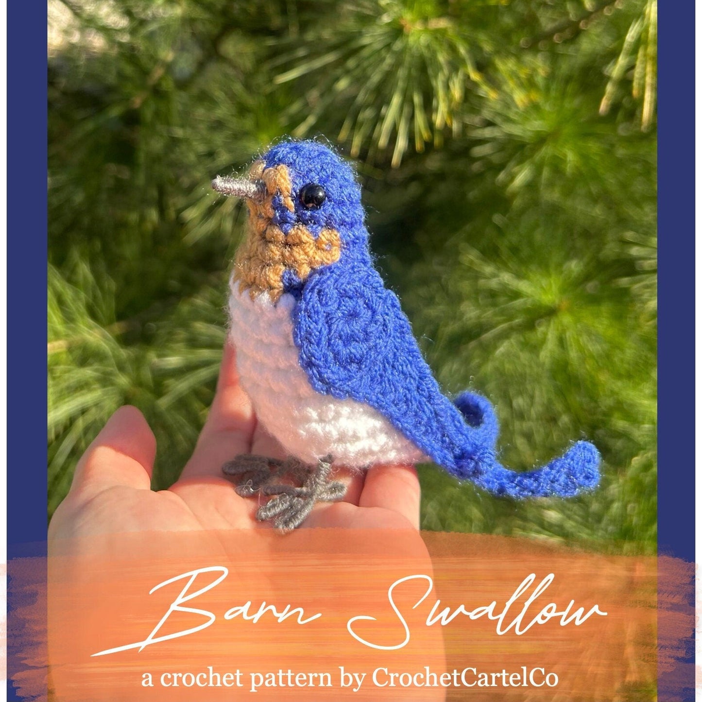A blue, orange, and white crocheted barn swallow crochet pattern shown with a green leafy background