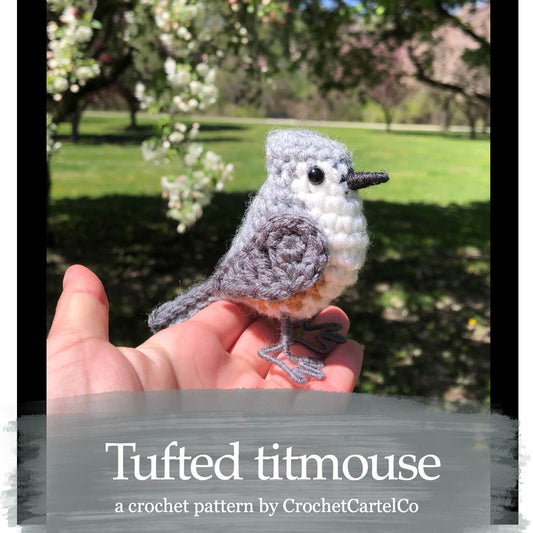 Crochet pattern for a tufted titmouse, shown with a garden background