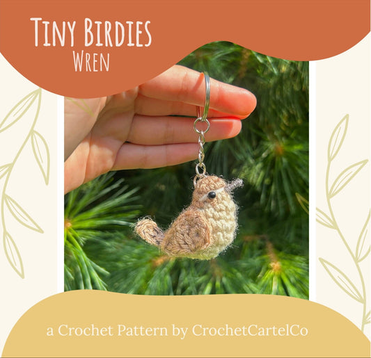 A crochet wren bird keychain crochet pattern shown with a green leafy background
