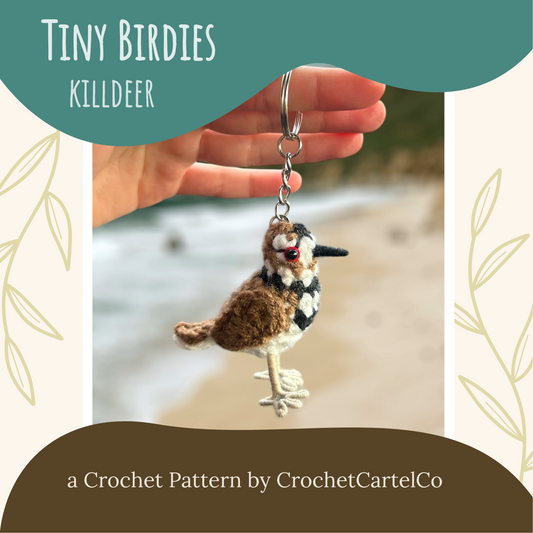 Hand holding a crochet keychain of a killdeer bird crochet pattern with 'Tiny Birdies Killdeer' text and CrochetCartelCo branding.